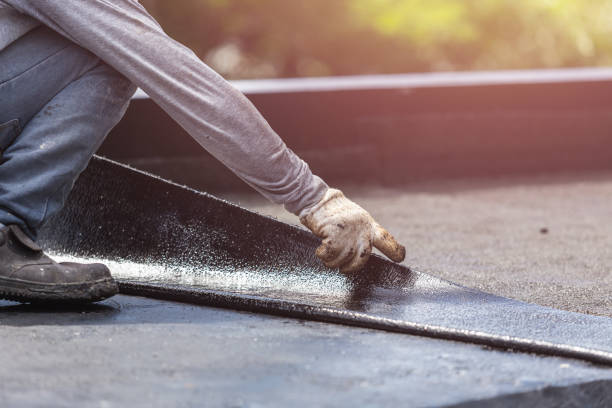 Professional Basement Waterproofing technician working in Colden, NY
